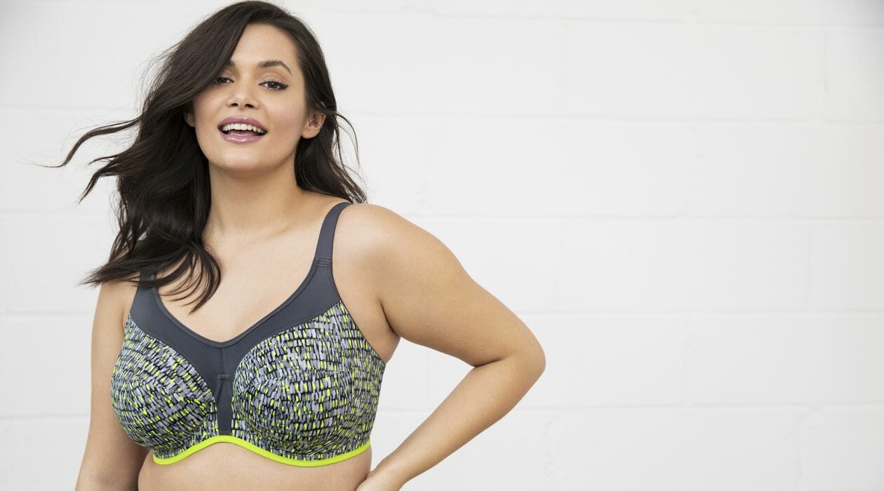 Woman in a vibrant coloured sports bra.