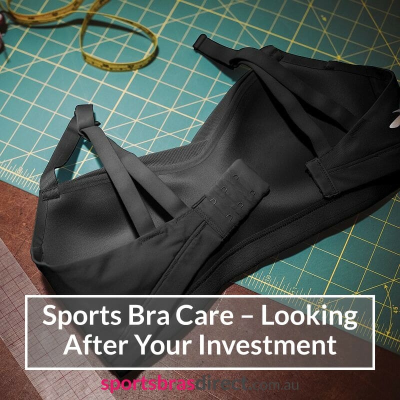 A Black bra laid on a table.