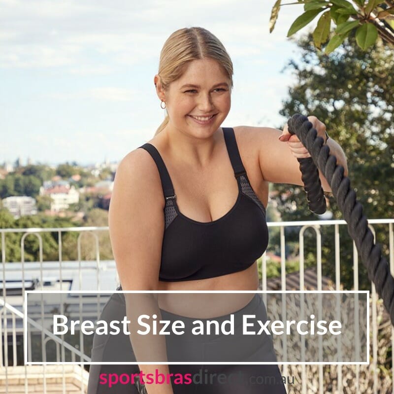 Woman in a Black sports bra doing battle ropes.