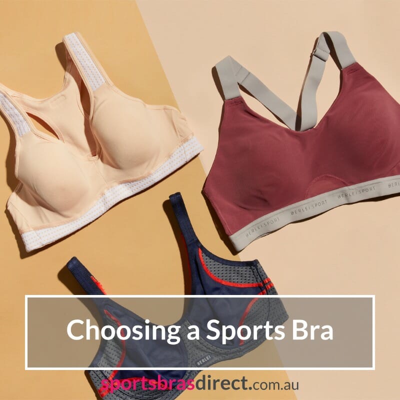 Three sports bras laid flat on a table.