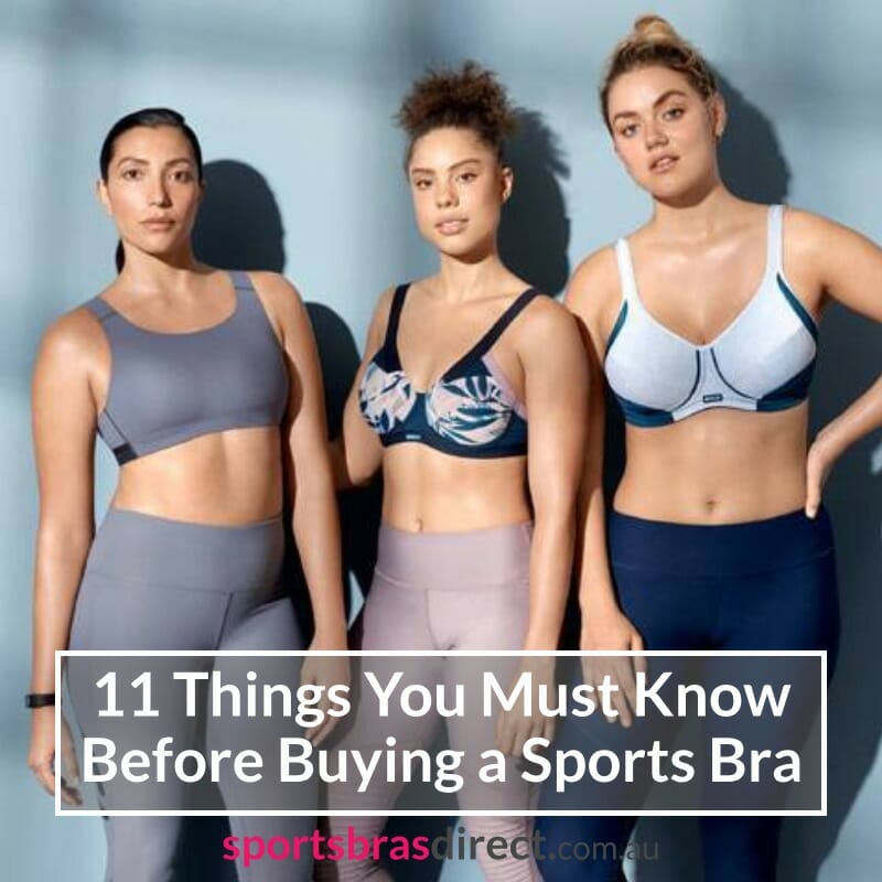 Three women in colourful sports bras standing together.