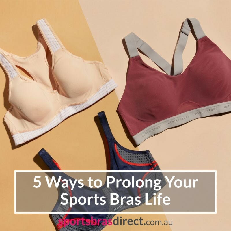 Three colourful sports bras laying on a flat surface.
