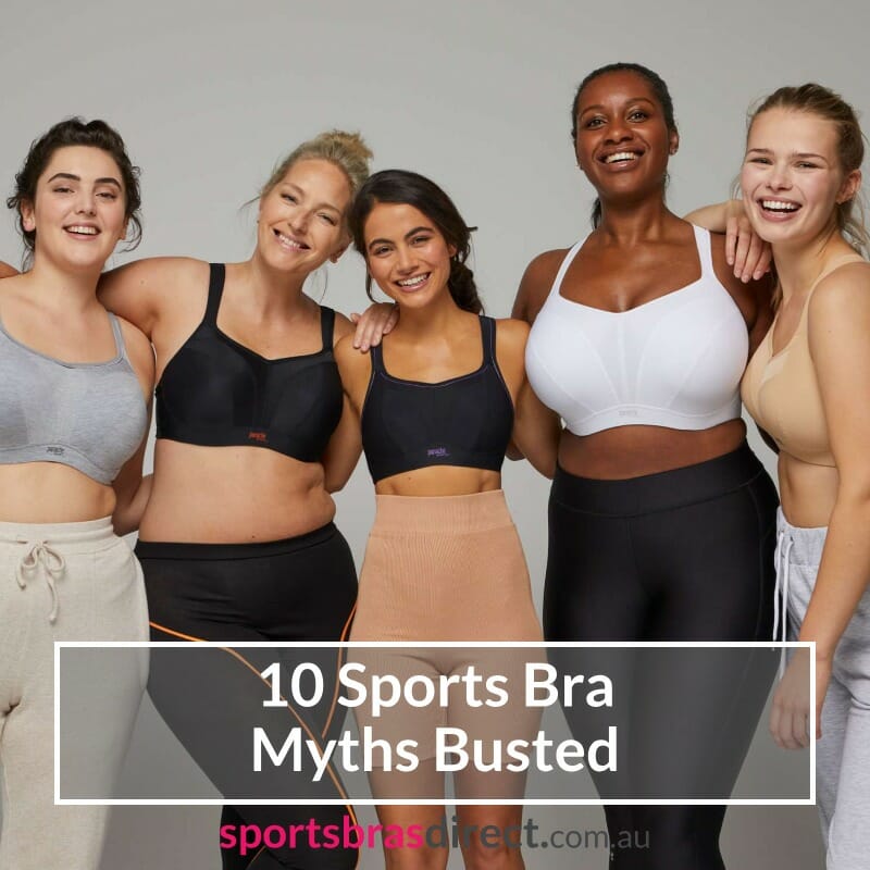 Five women wearing sports bras standing together.