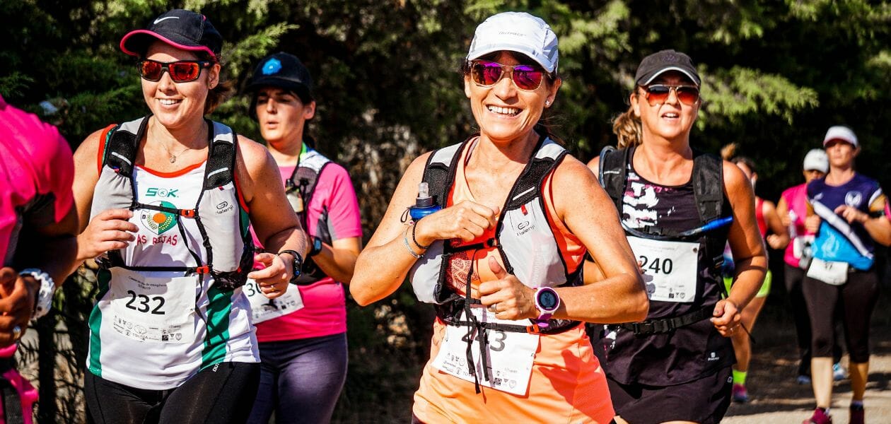 Women competing in as long distance running race.
