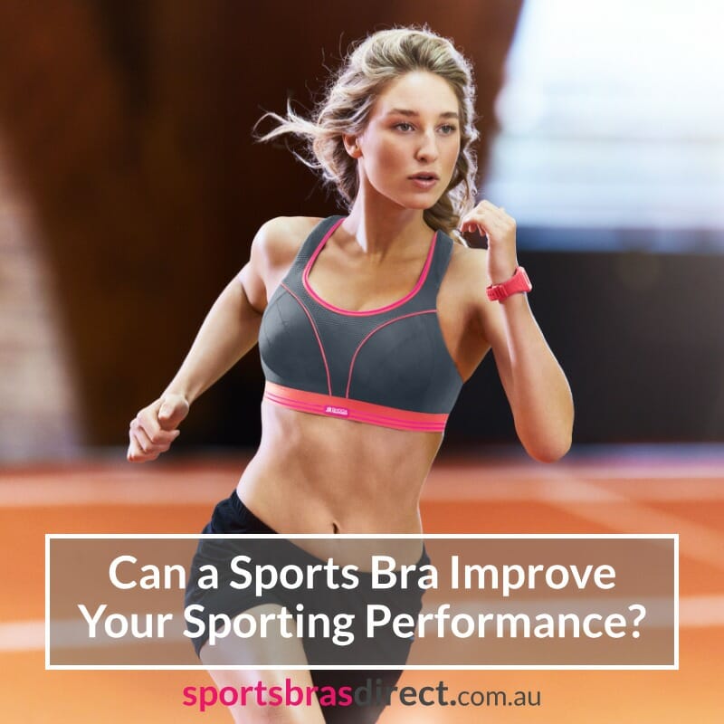 Woman running on a track in a sports bra.