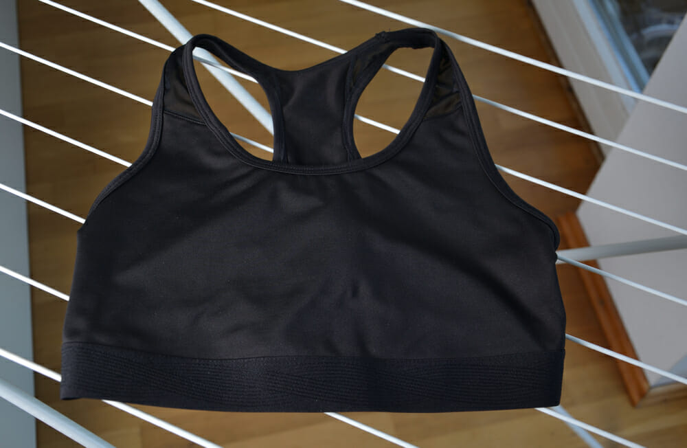 sports bra on a laundry stand