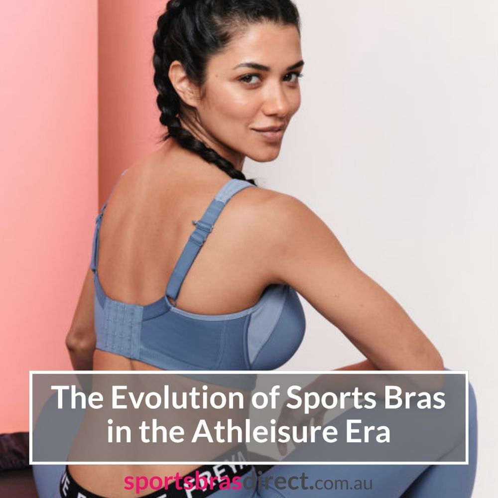 Woman sitting wearing a Blue sports bra.