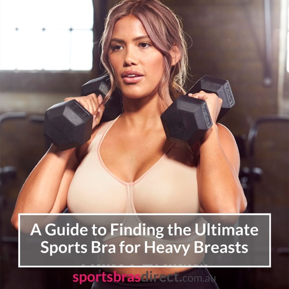 Woman in a sports bra lifting weights.