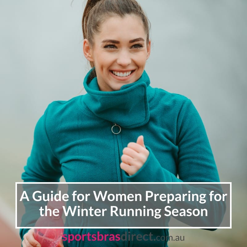 Woman smiling whilst running in a jacket.