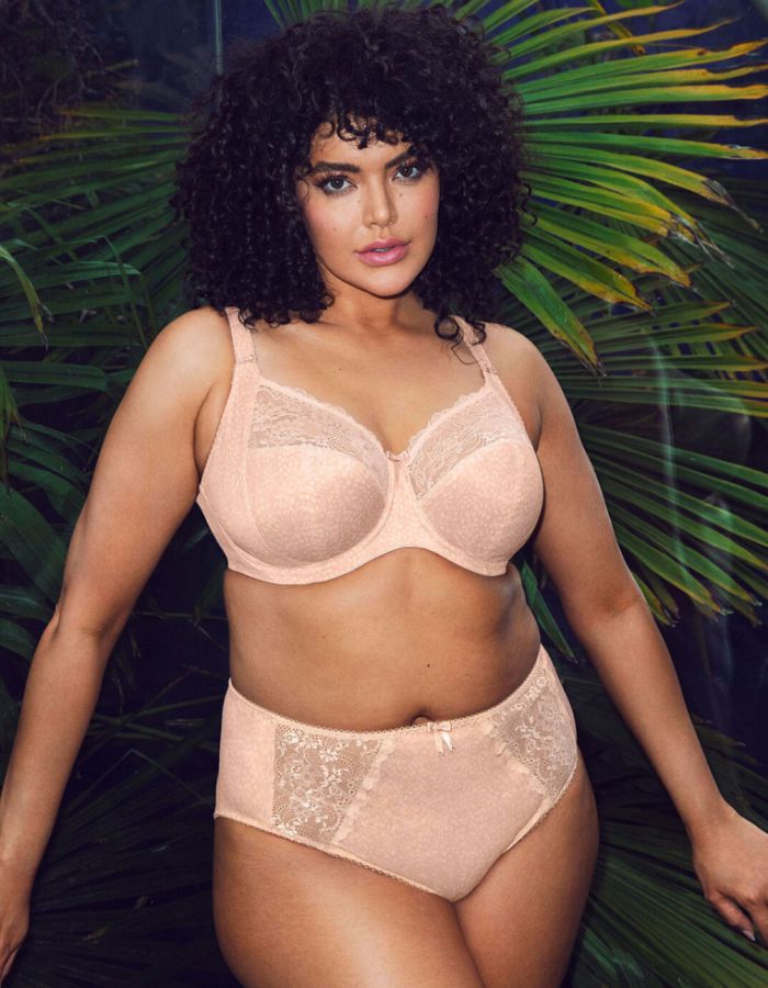 Woman wearing light coloured lingerie.