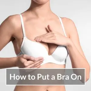 Woman adjusting her White bra.