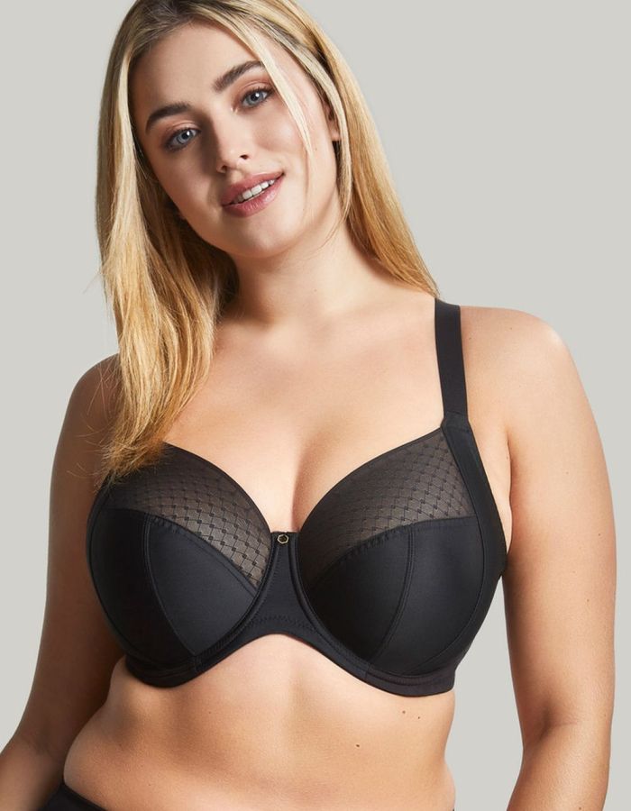 Woman wearing a Black bra.